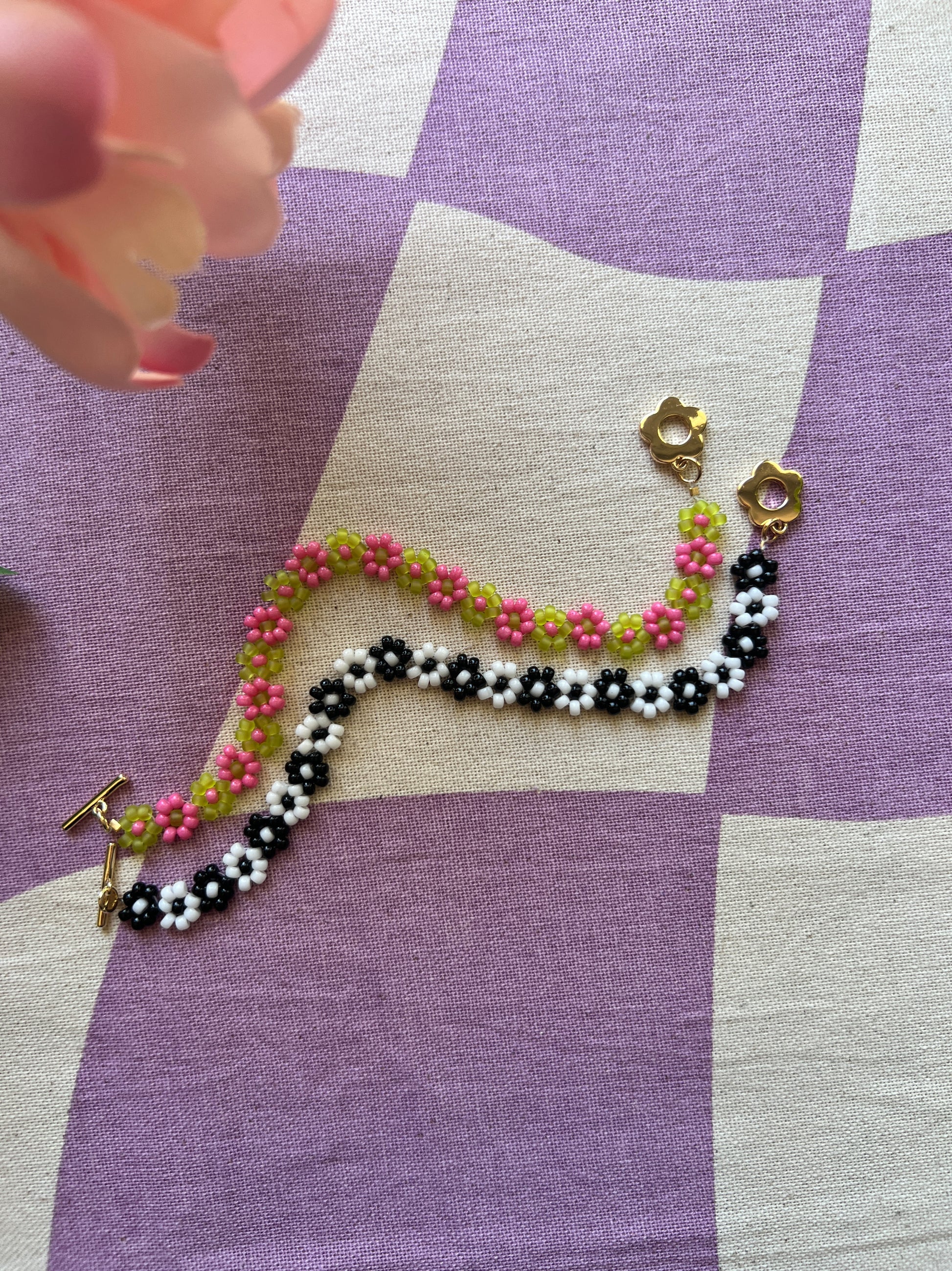 Beaded bracelets on checkered tablecloth